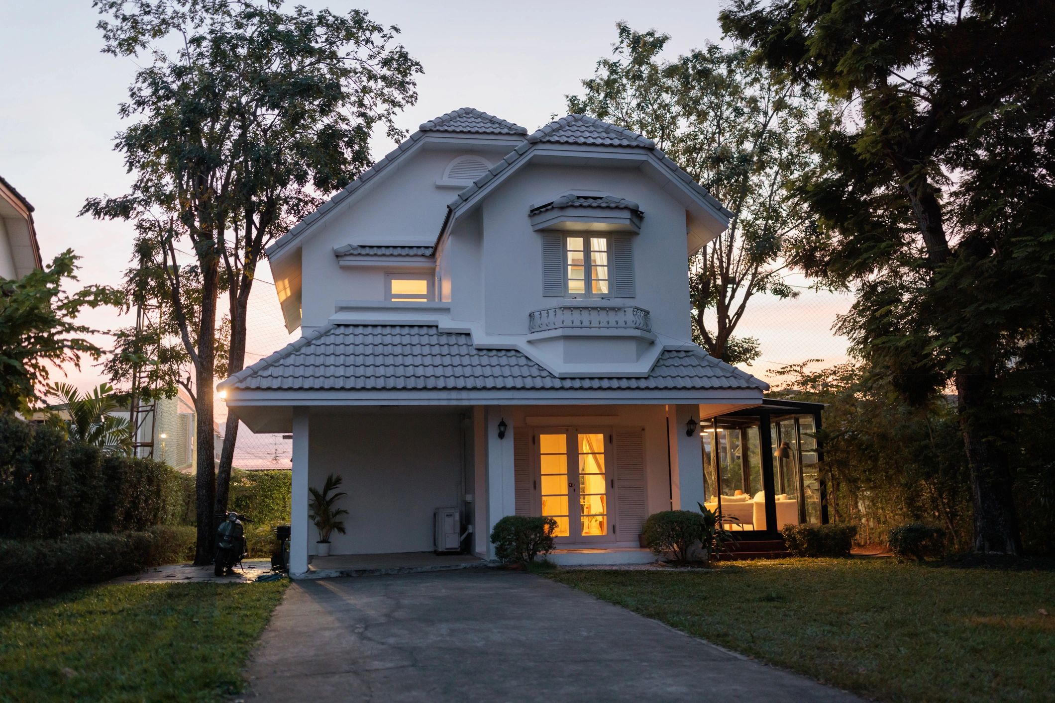 Home exterior at dusk with clean, updated curb appeal